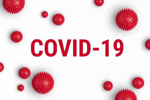 the words covid-19 surrounded by red 'germs' on a white background, a blog on how to sell property during covid-19.